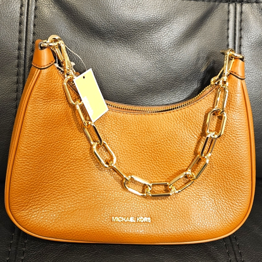MK Brown large pebbled leather Hand bag